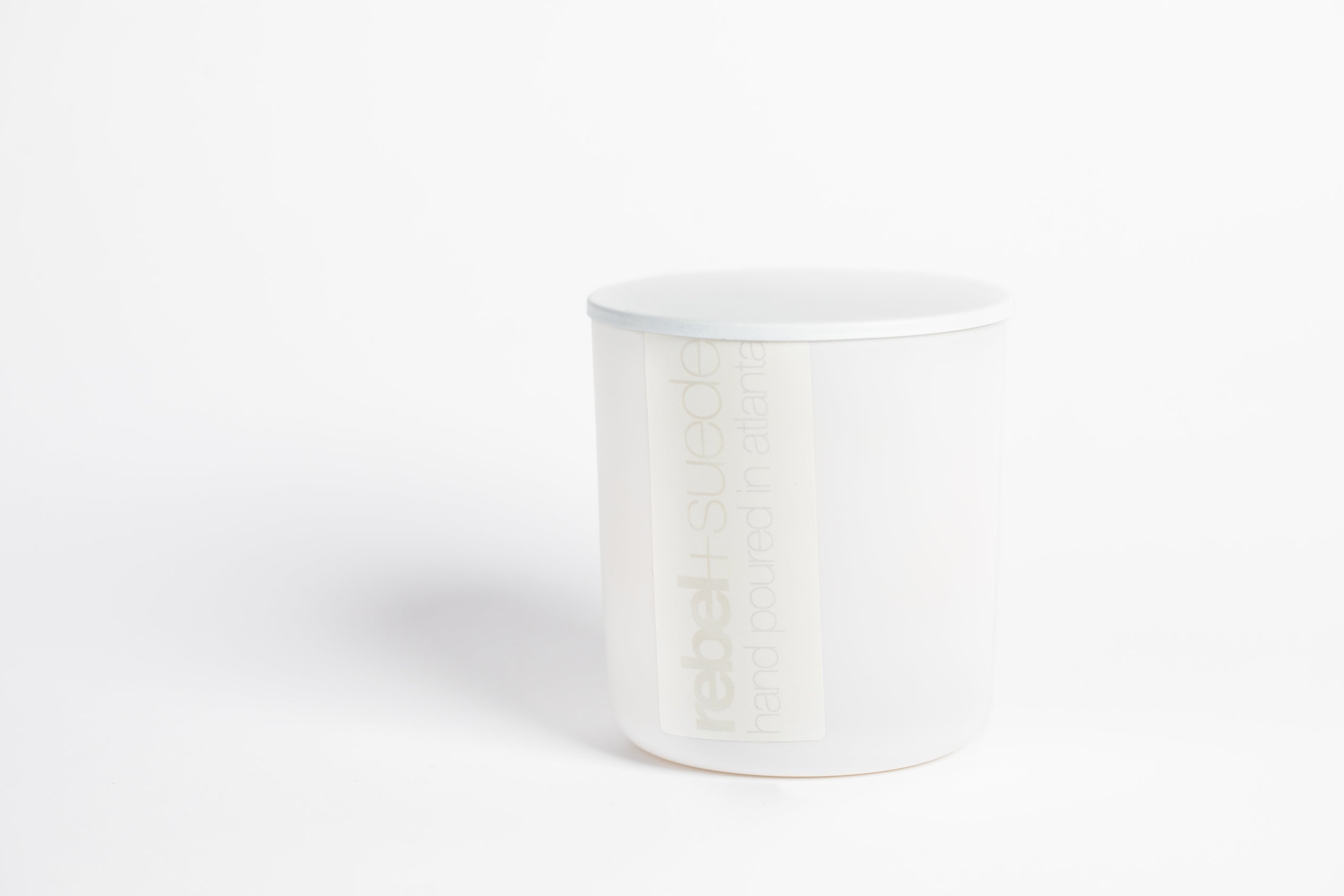 the one - rebel + suede | handcrafted candles | luxury candles